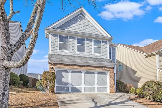 view of front of property with a garage