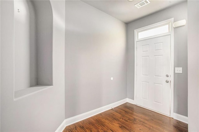 foyer with hardwood / wood-style flooring