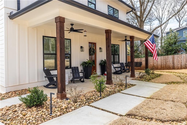 property entrance with covered porch and ceiling fan