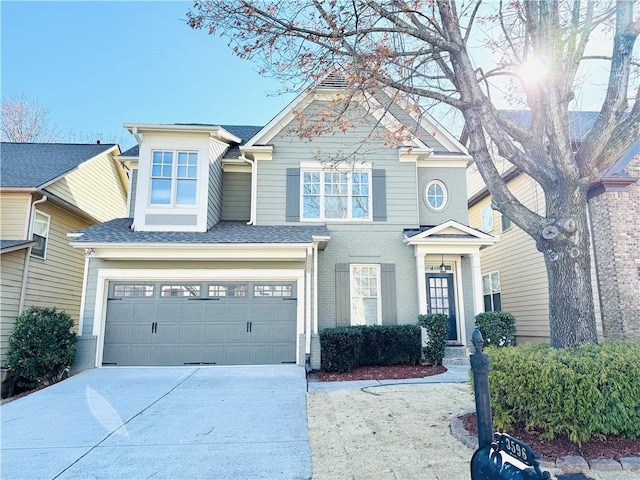 view of front of home with a garage