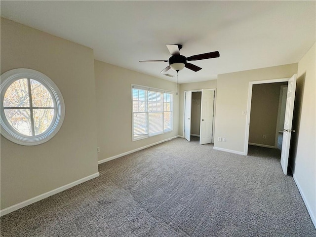 unfurnished bedroom with carpet and ceiling fan