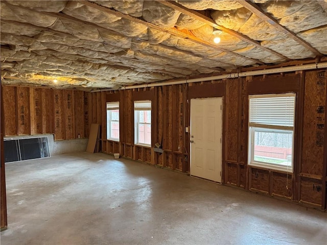 interior space featuring unfinished concrete floors