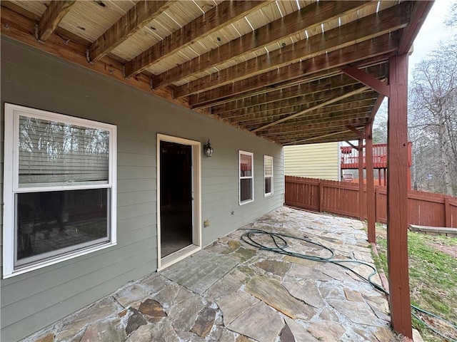 view of patio with fence