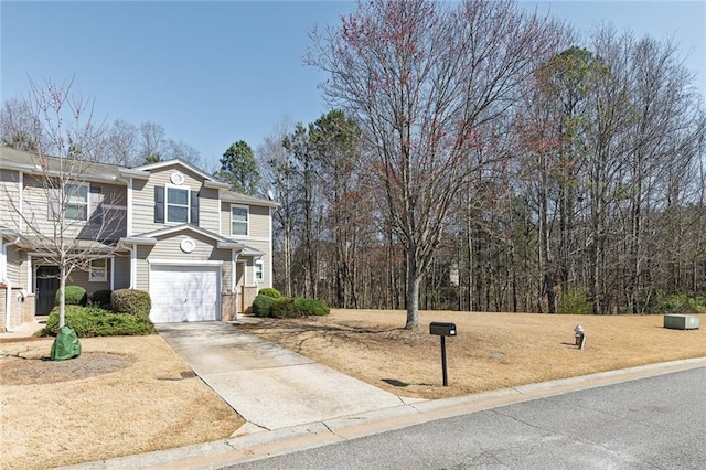 view of front facade featuring a garage and driveway