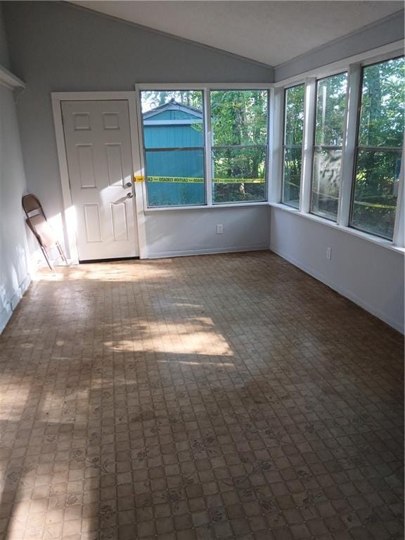 2218 Etowah River Rd, Dawsonville, GA 30534 - unfurnished sunroom featuring lofted ceiling and healthy amount of natural light