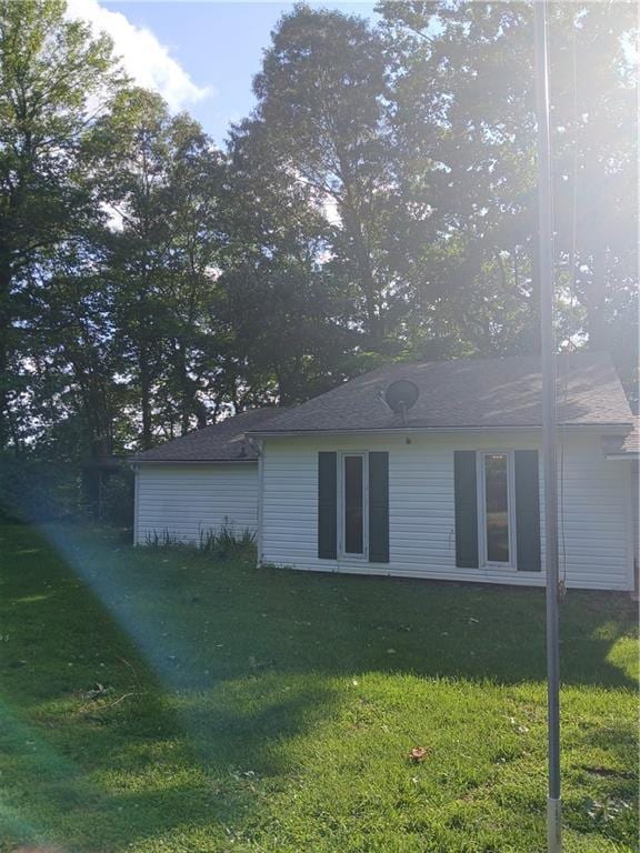 2218 Etowah River Rd, Dawsonville, GA 30534 - back of house with a lawn