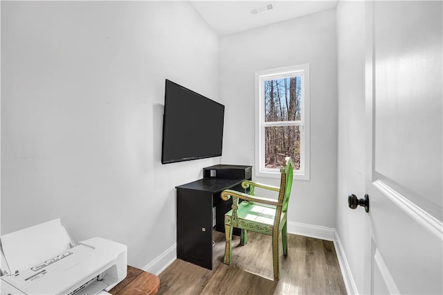 office with wood-type flooring