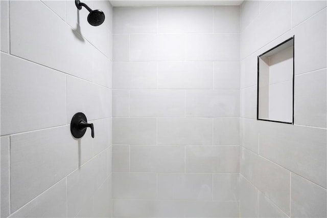 details featuring a tile shower