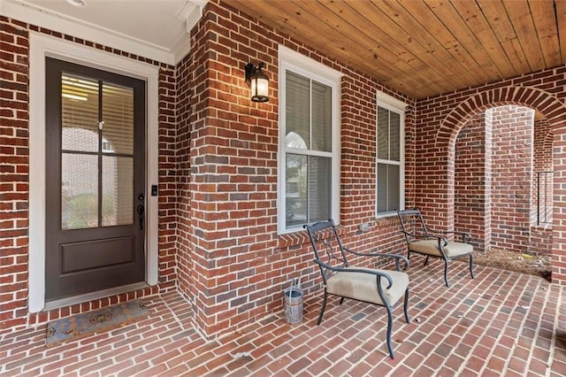 property entrance with covered porch