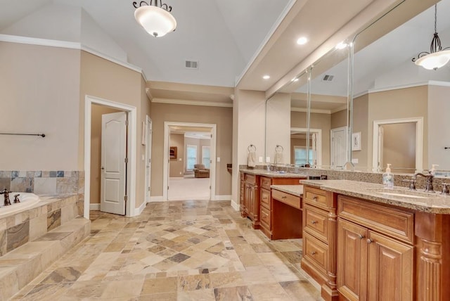 full bath with vaulted ceiling, a garden tub, double vanity, recessed lighting, and ornamental molding