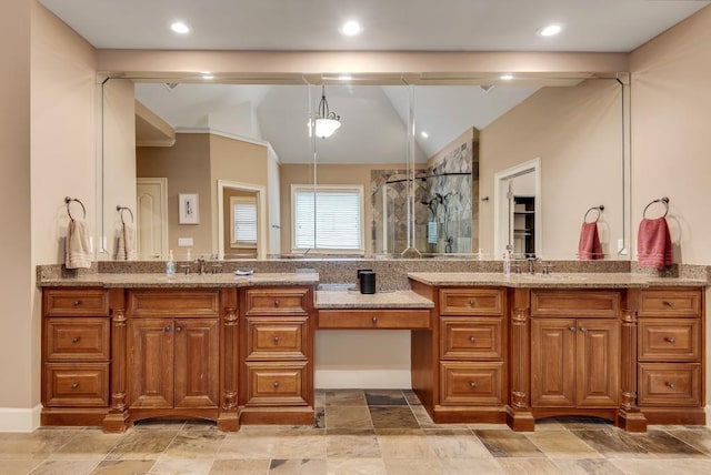 full bathroom featuring lofted ceiling, a stall shower, vanity, recessed lighting, and stone finish floors