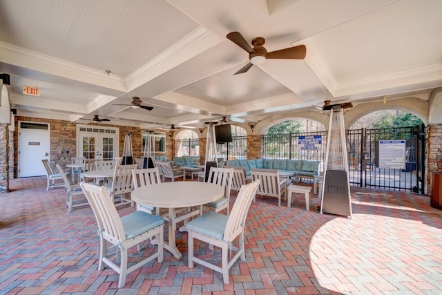 view of patio featuring french doors, outdoor dining area, outdoor lounge area, fence, and ceiling fan