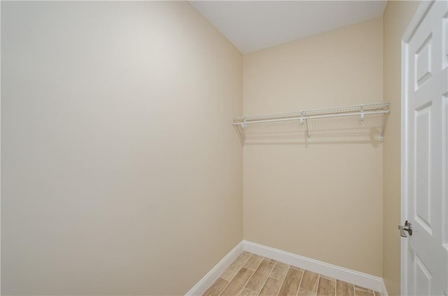1965 Nocturne Dr Unit 1306A, Alpharetta, GA 30009 - spacious closet with light wood finished floors