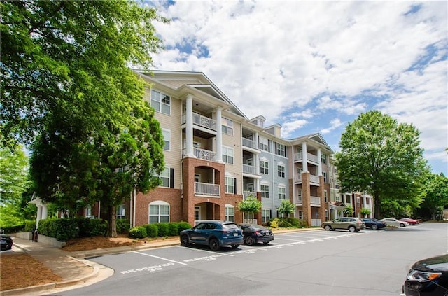 1965 Nocturne Dr Unit 1306A, Alpharetta, GA 30009 - view of apartment building / complex with uncovered parking