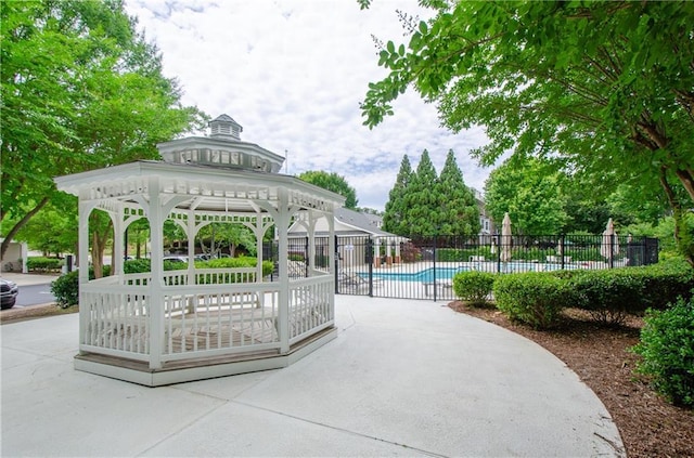 1965 Nocturne Dr Unit 1306A, Alpharetta, GA 30009 - view of property's community with a gazebo, a pool, and a patio