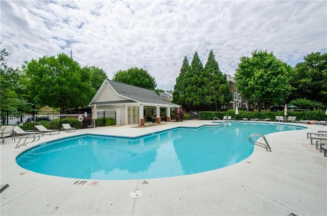 1965 Nocturne Dr Unit 1306A, Alpharetta, GA 30009 - community pool featuring a patio area