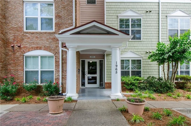 1965 Nocturne Dr Unit 1306A, Alpharetta, GA 30009 - view of exterior entry featuring covered porch