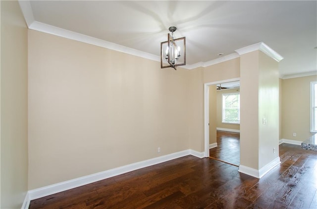 1965 Nocturne Dr Unit 1306A, Alpharetta, GA 30009 - unfurnished room featuring ornamental molding, a chandelier, dark wood-style flooring, and baseboards