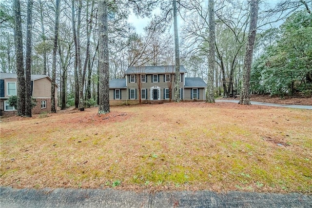 view of front of home with a front yard