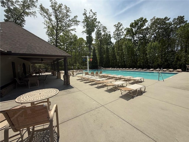 2873 Shoals Hill Ct, Dacula, GA 30019 - community pool featuring a patio and ceiling fan