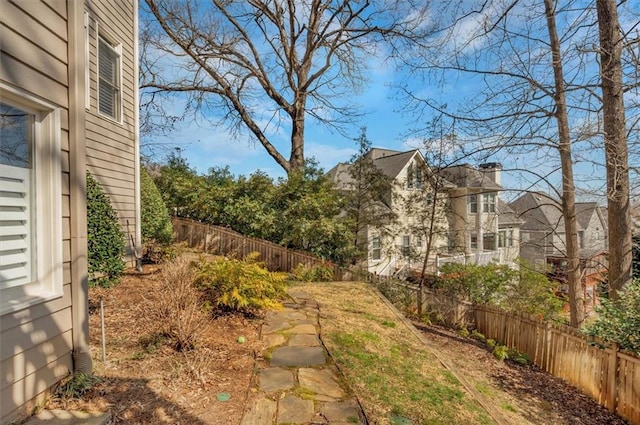 view of yard featuring a fenced backyard