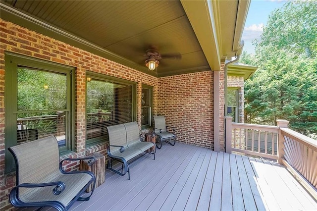 wooden terrace with ceiling fan