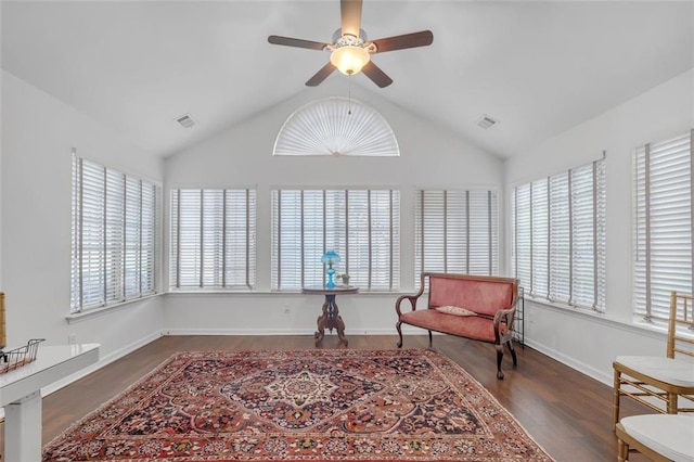 1402 Silver Summit Dr SE, Conyers, GA 30094 - sitting room with plenty of natural light, ceiling fan, wood finished floors, and lofted ceiling