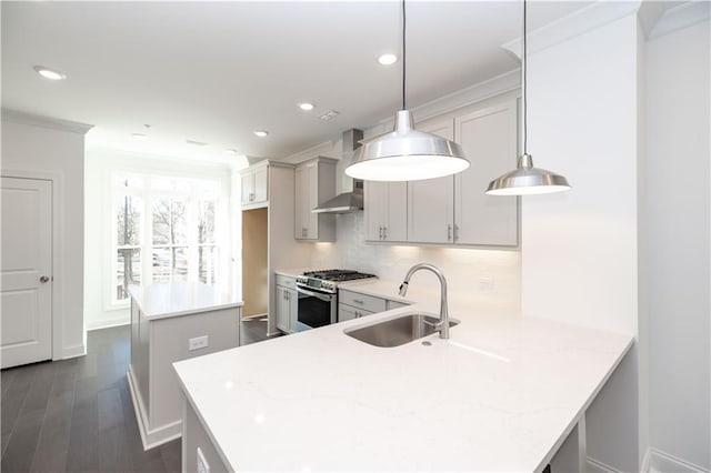 352 Olmstead Way Unit 28, Alpharetta, GA 30022 - kitchen featuring wall chimney range hood, stainless steel gas stove, tasteful backsplash, dark wood finished floors, and a peninsula