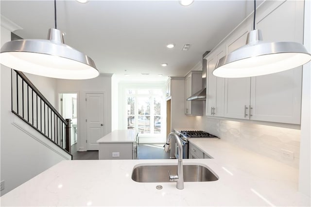 352 Olmstead Way Unit 28, Alpharetta, GA 30022 - kitchen featuring tasteful backsplash, light stone counters, recessed lighting, pendant lighting, and stainless steel range with gas cooktop