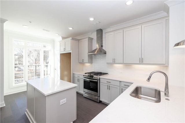 352 Olmstead Way Unit 28, Alpharetta, GA 30022 - kitchen featuring gas stove, wall chimney exhaust hood, decorative backsplash, dark wood-type flooring, and recessed lighting