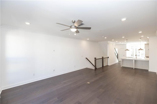 352 Olmstead Way Unit 28, Alpharetta, GA 30022 - unfurnished living room featuring recessed lighting, ornamental molding, dark wood-type flooring, and ceiling fan