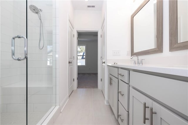 352 Olmstead Way Unit 28, Alpharetta, GA 30022 - full bath featuring a stall shower, vanity, and tile patterned flooring