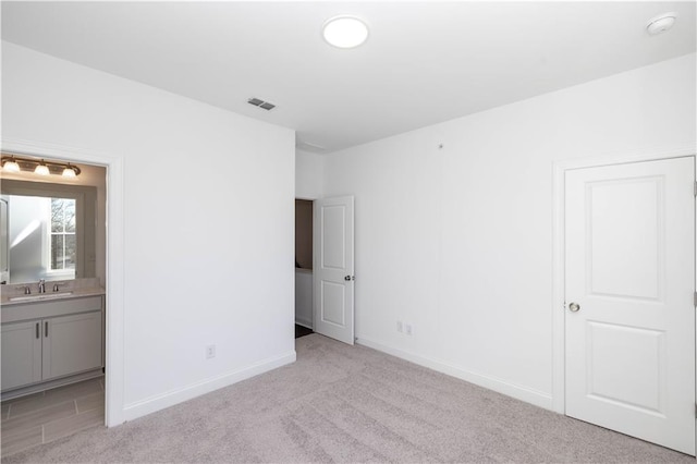 352 Olmstead Way Unit 28, Alpharetta, GA 30022 - unfurnished bedroom featuring light colored carpet and ensuite bathroom