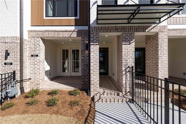 352 Olmstead Way Unit 28, Alpharetta, GA 30022 - property entrance featuring brick siding, a patio, and french doors