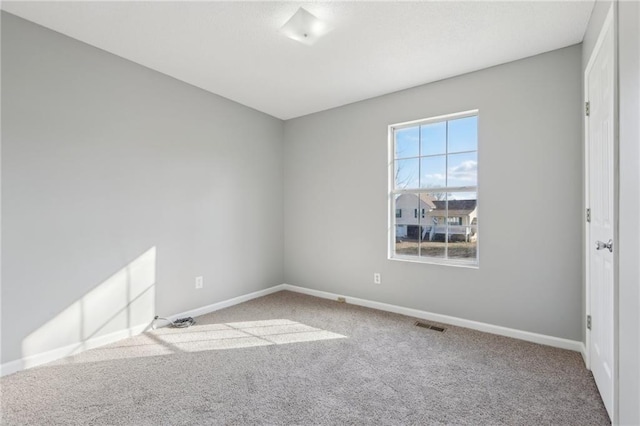 view of carpeted spare room