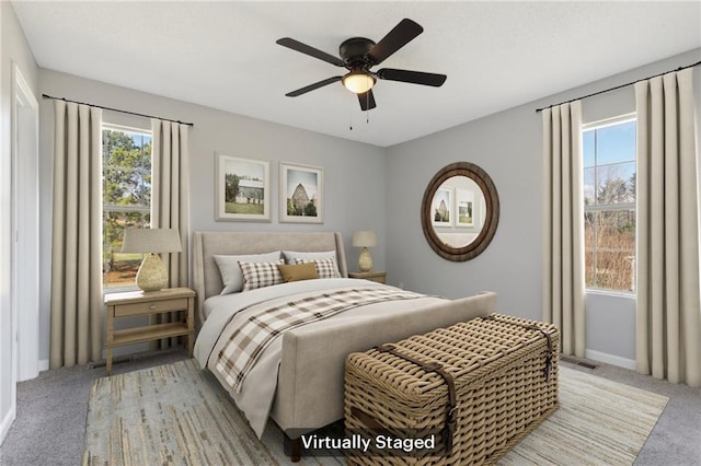 carpeted bedroom with ceiling fan