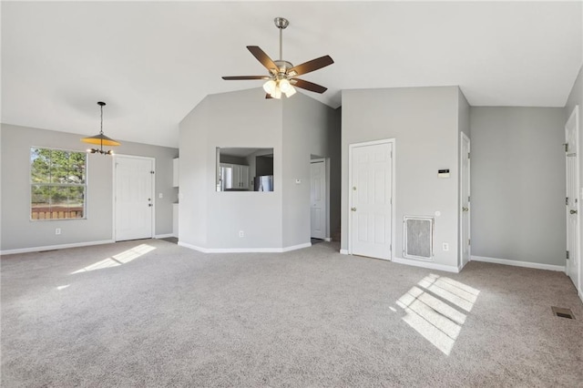 unfurnished living room featuring light colored carpet, high vaulted ceiling, and ceiling fan