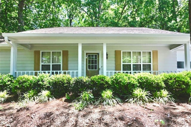 3436 Finglas Dr, Marietta, GA 30008 - ranch-style home featuring a porch and roof with shingles