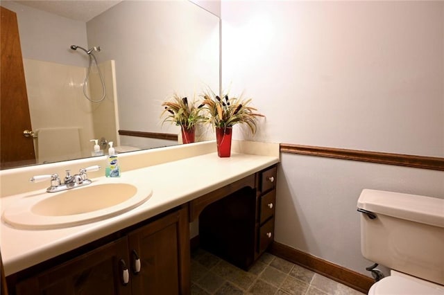 3436 Finglas Dr, Marietta, GA 30008 - bathroom with vanity, toilet, baseboards, and a shower