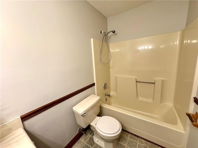 3436 Finglas Dr, Marietta, GA 30008 - full bath featuring toilet, a textured ceiling, and bathing tub / shower combination