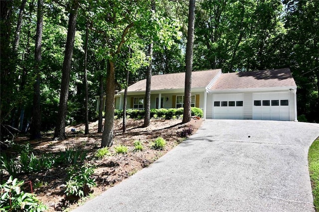 3436 Finglas Dr, Marietta, GA 30008 - ranch-style house featuring an attached garage and driveway