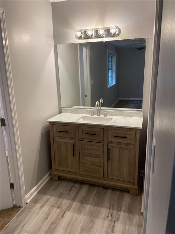 1150 Rankin St Unit D1, Stone Mountain, GA 30083 - bathroom with vanity and wood finished floors