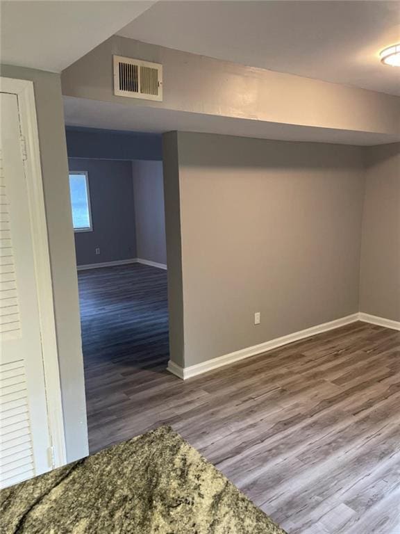 1150 Rankin St Unit D1, Stone Mountain, GA 30083 - basement with baseboards and wood finished floors