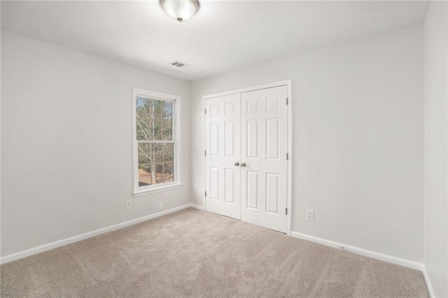 10950 Glenhurst, Duluth, GA 30097 - unfurnished bedroom featuring carpet flooring and a closet