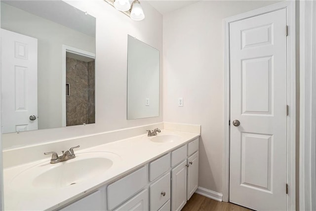 10950 Glenhurst, Duluth, GA 30097 - bathroom with double vanity and wood finished floors