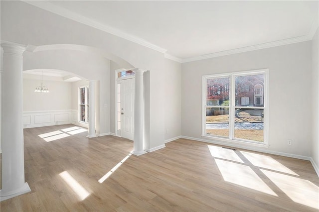 10950 Glenhurst, Duluth, GA 30097 - unfurnished room featuring ornate columns, arched walkways, light wood-style flooring, and crown molding