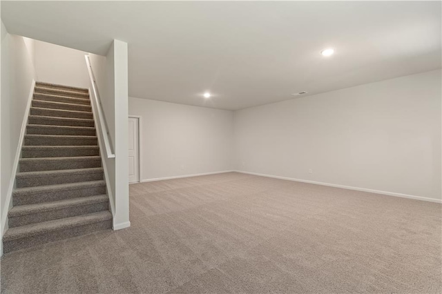 basement featuring carpet floors