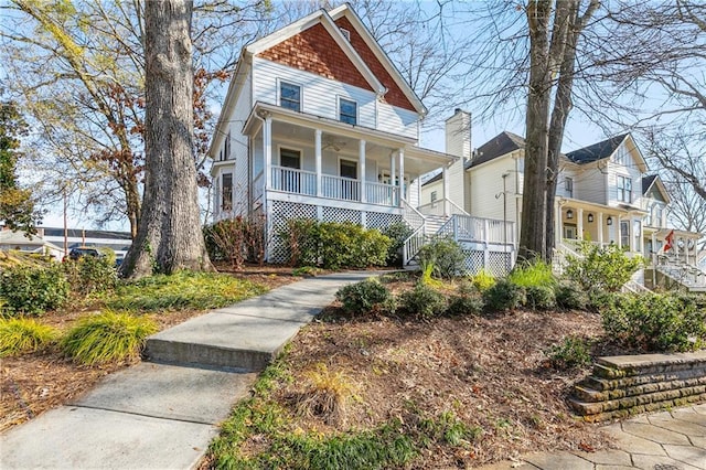 view of property featuring covered porch