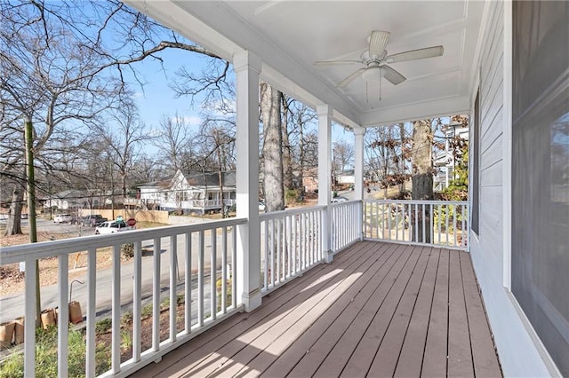 wooden deck with ceiling fan