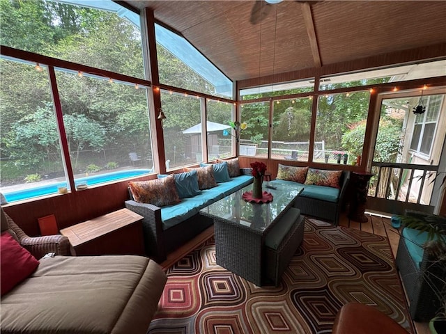 2671 Club Forest Ct SE, Conyers, GA 30013 - sunroom featuring an outdoor living space and lofted ceiling